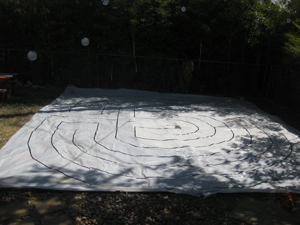 A larger labyrinth being used outside at Out Youth.
